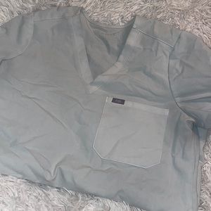 White scrub top figs